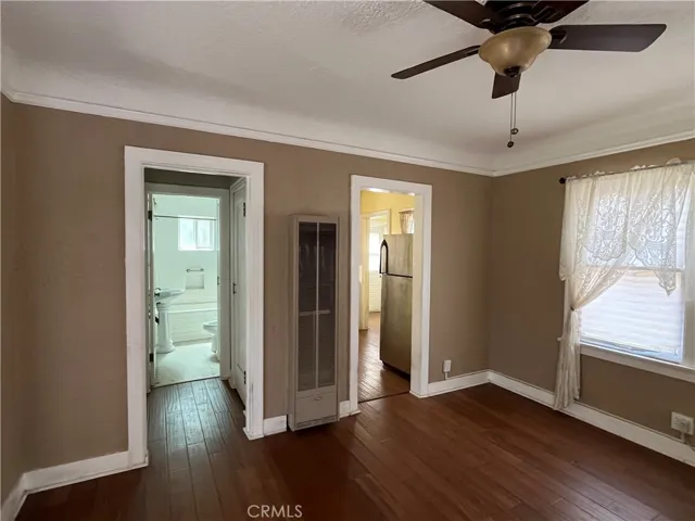 Doors to bedroom and bath and one to the kitchen