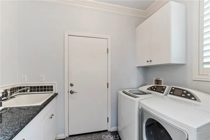 Washer & Dry Included. Cabinets & Utility Sink