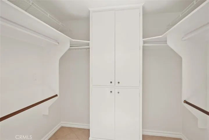 Walk-in closet in the primary bedroom.