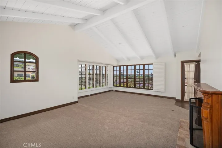 Expansive Living Room with Fireplace and Ocean Views.