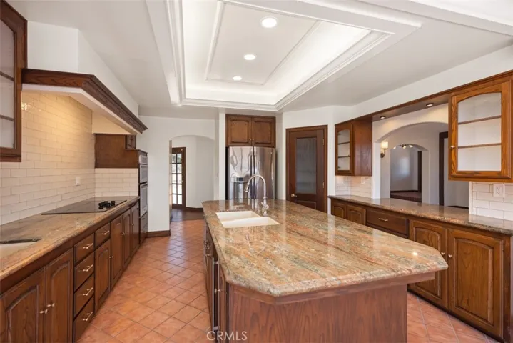 Large Center Island with Wine Refrigerator.