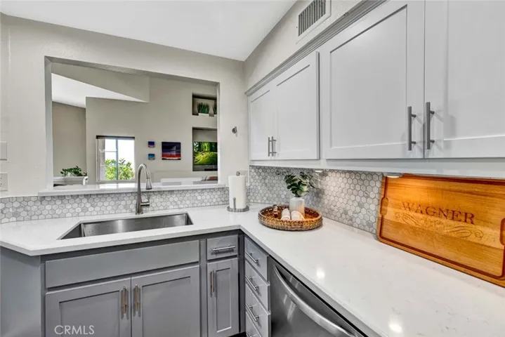 Love the white quart and custom backsplash