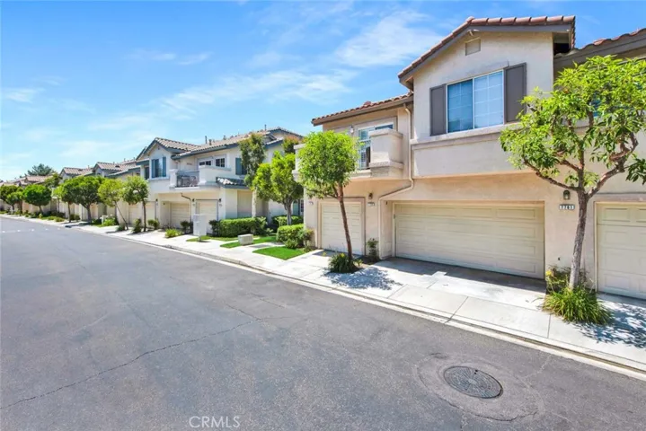 Two car attached garage with direct access and custom storage