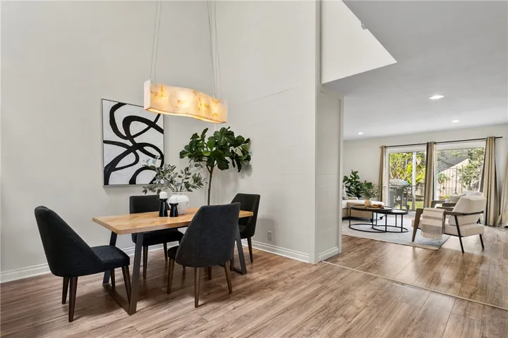 The dining area has tremendous volume ceilings!
