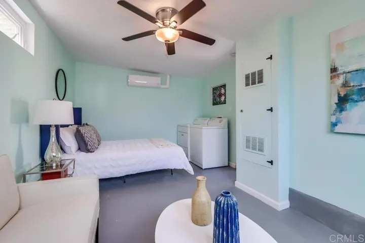 Garage, which is currently set up like an ADU/Bedroom/Bathroom.
