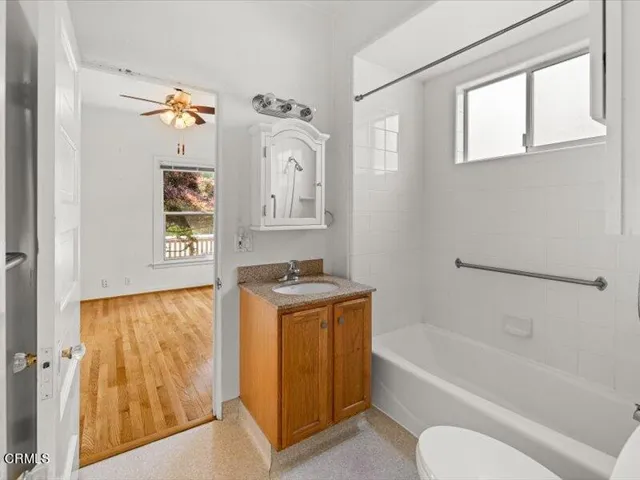 View of bathroom and bedroom