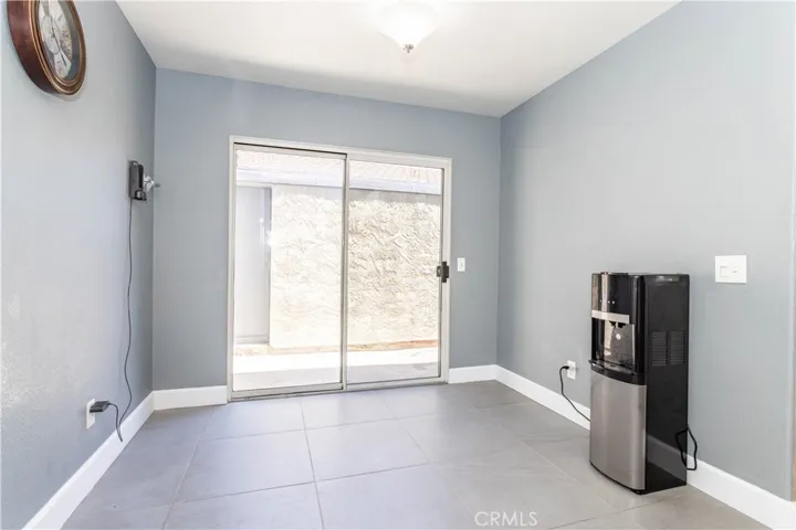 Eat in kitchen, sliding glass doors to private outdoor patio.