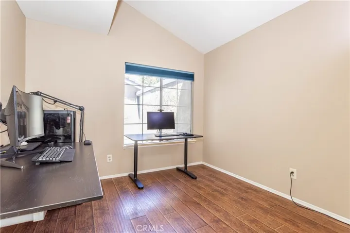 Room #4 with angled vaulted ceiling.