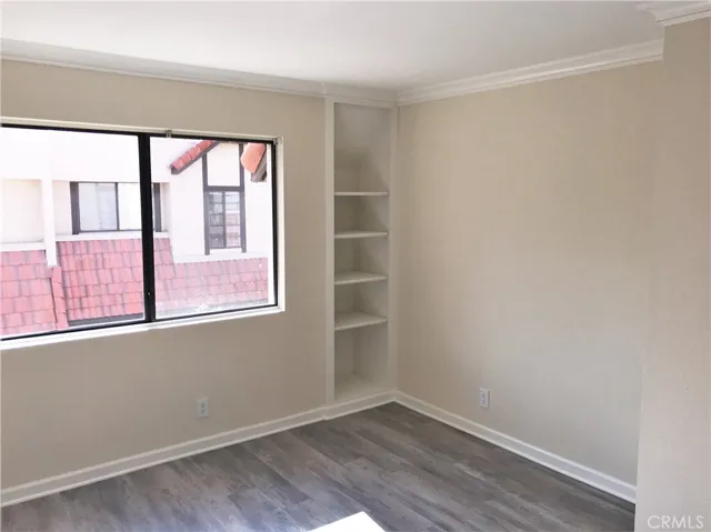 Master bedroom with built-in book case