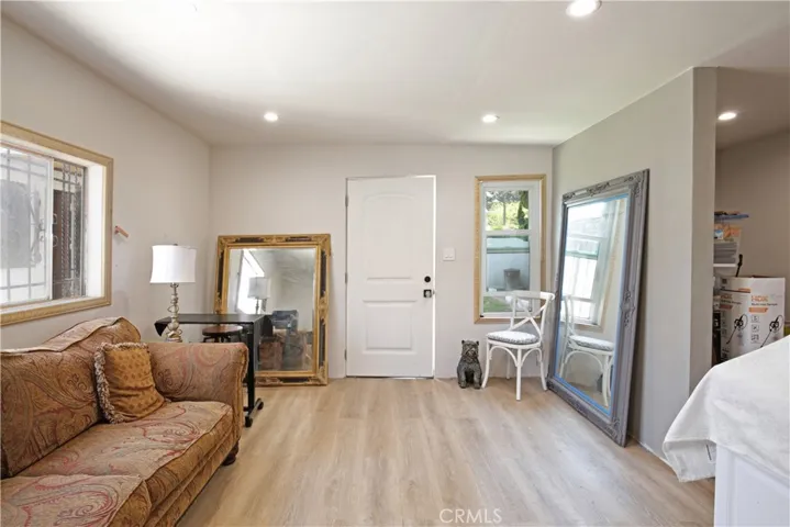 DETACHED BONUS ROOM - View from inside looking towards front door - storage  space to the right