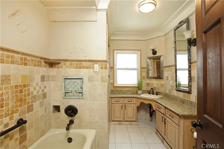 Roomy bathroom with both tub and separate shower enclosure