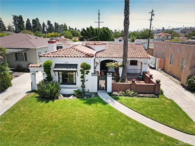 Clay tile roof, spanish decorated tile at bay window,