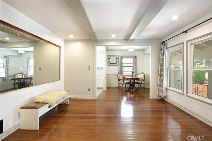 Spacious dining room that flows easily into nook and kitchen for easy entertaining