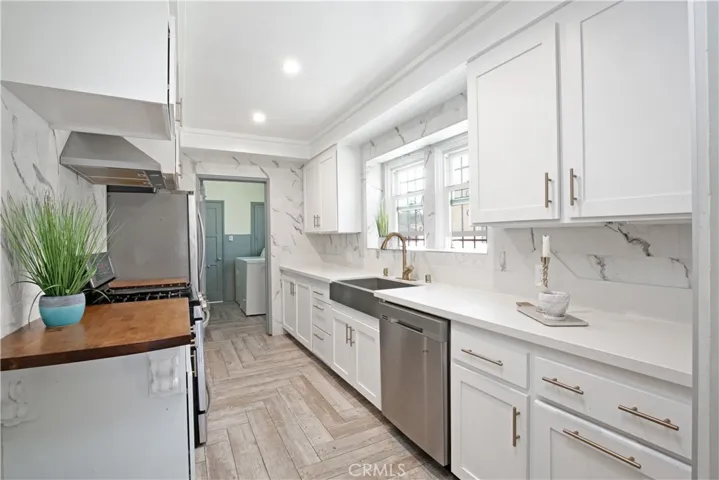 Newer remodeled kitchen with quartz countertops