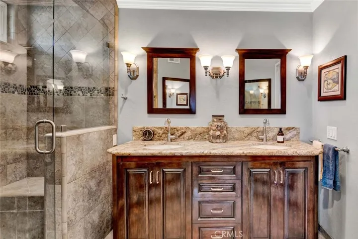 Primary Suite Remodeled with Dual Sinks, Custom Solid Wood Vanity, Oversized Shower with Sitting Bench, Privacy Toilet