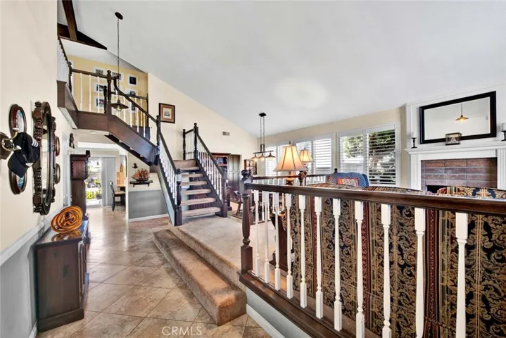 Dramatic Custom Hardwood Staircase and Railings