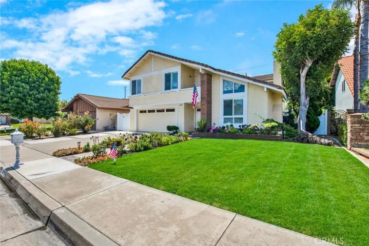 Beautiful Curb Appeal with Manicured Landscaping