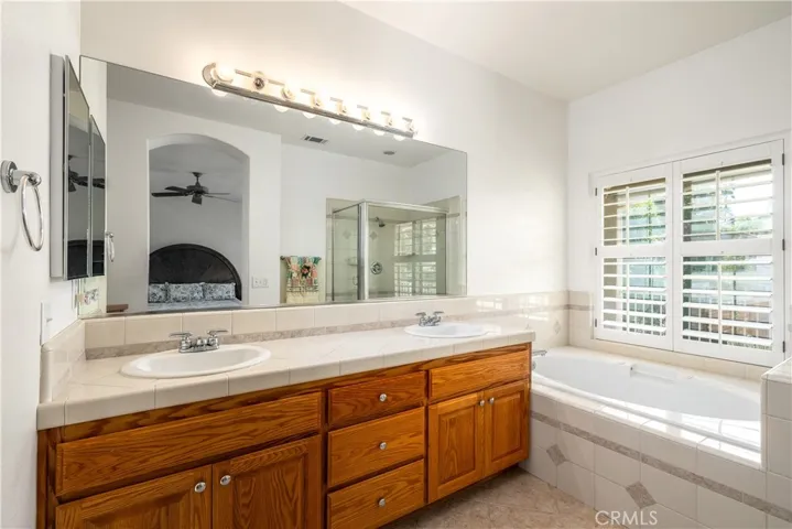 Massive primary bath has a walk in closet and linen area!