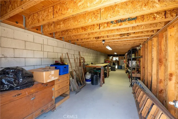 TONS of storage under the large patio!