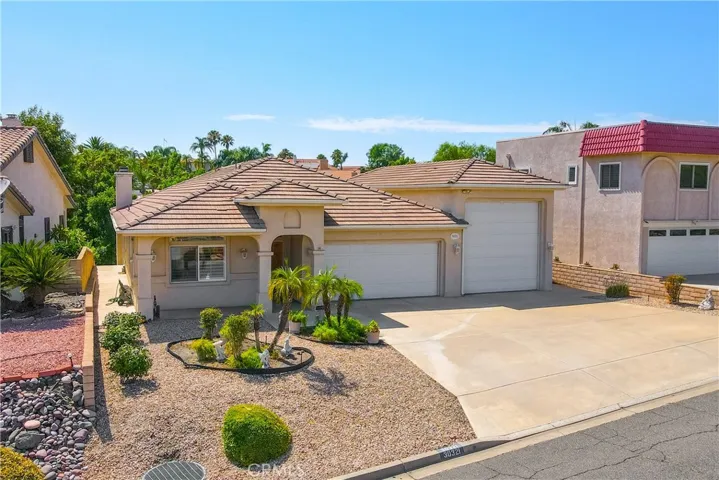 Gorgeous curb appeal and seamless flow of RV garage!