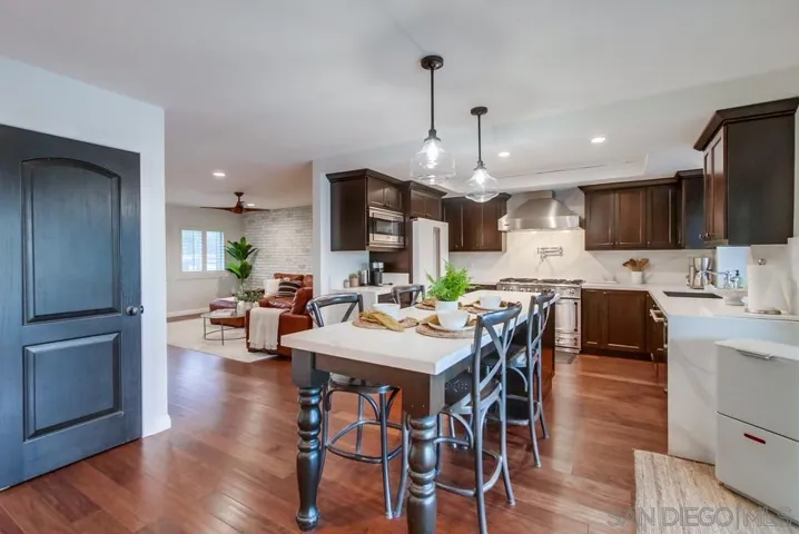 From the den into the kitchen/living room