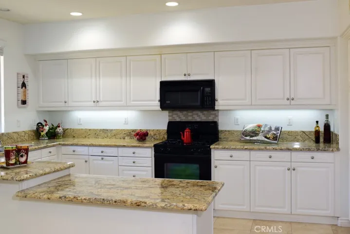 large gourmet kitchen with add on counter space and storage.