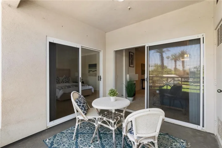 Patio with a view of a neighborhood park.