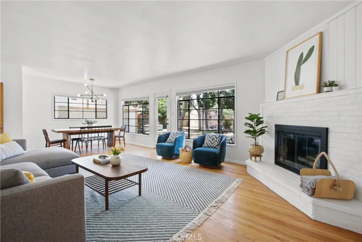 The living/dining room is one large open space with direct access to the back yard.
