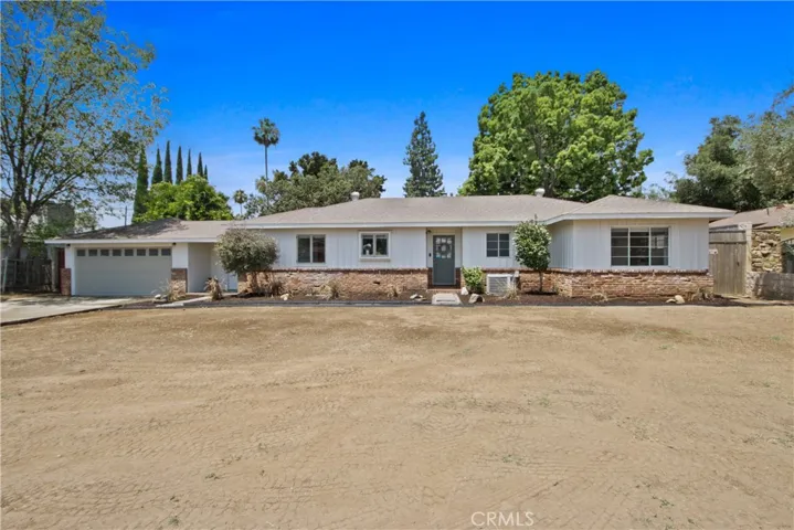 Curbside view of this single family North Tustin Home.