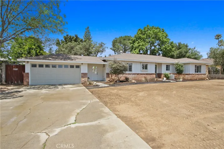 Attached 2 car garage and plenty of driveway parking.