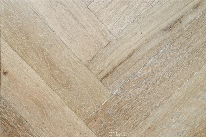 Herringbone wood flooring.