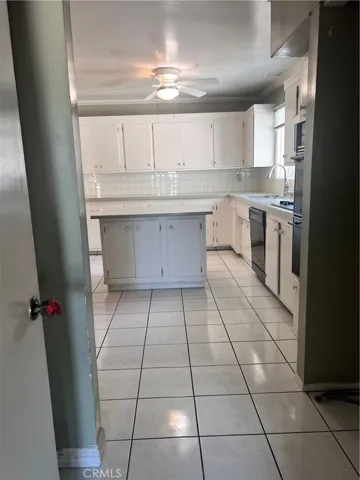 Additional room looking into kitchen
