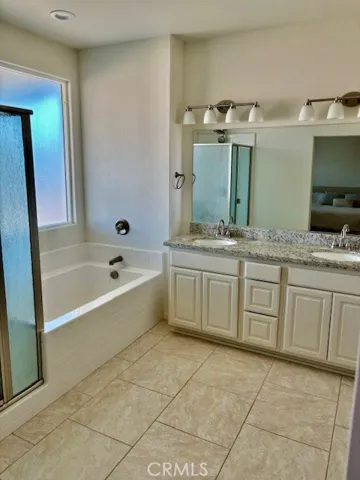 Master bath with dual sins, separate shower and bath