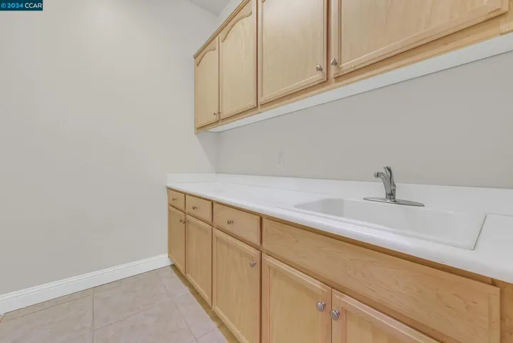 Features a Sink, Counter Space, & Cabinets