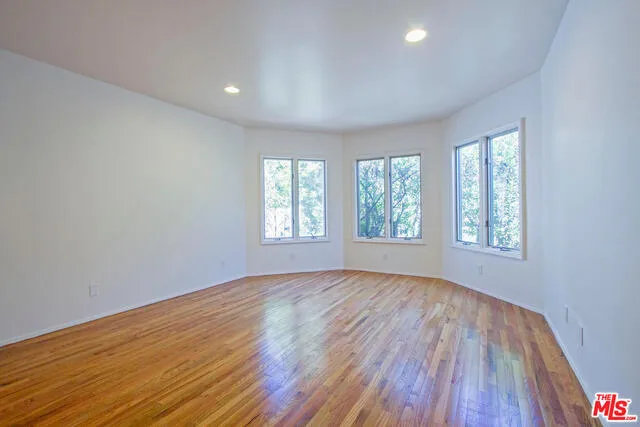 Large ensuite master with bay windows and walk-in closet