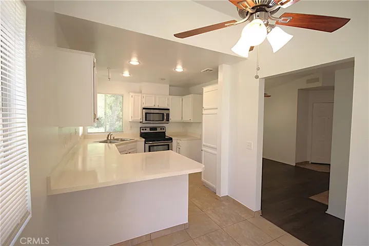Kitchen with breakfast bar.