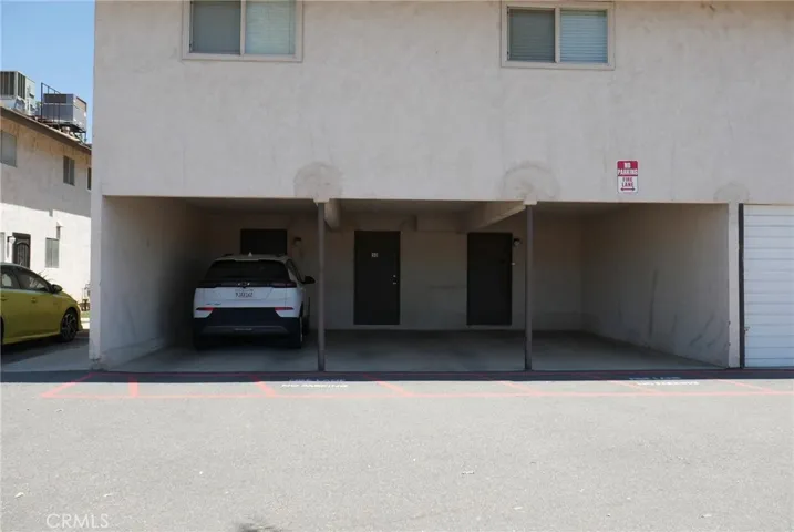 Carport: Space #50, fully covered, full depth, door to large storage closet. HOA does allow unit owners to enclose the carport at the owner's expense.