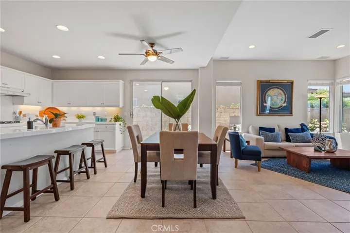 Open-concept kitchen that effortlessly merges with the family room, breakfast bar, and dining area.