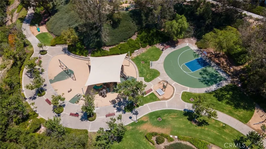 Las Flores's Oak Tree Park playground and sport court.