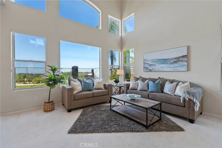 The Veranda community in Las Flores showcases breathtaking architecture with vaulted ceilings and abundant natural light.