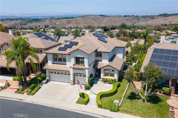 Aerial view of this stunning Las Flores home and the community.