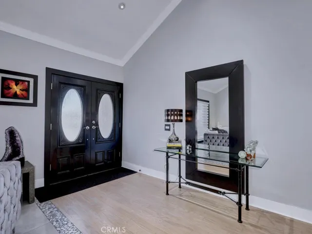 Beautiful double door entry with pocket screen door.