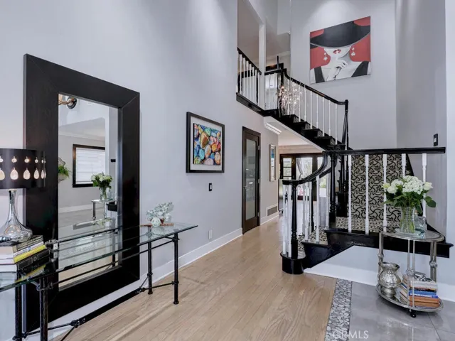 Foyer with hardwood floors