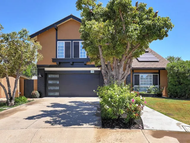 Nice long driveway and separate walk way to double door entry