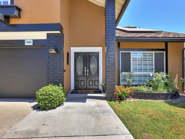 Beautiful double door entry with pocket screen door.