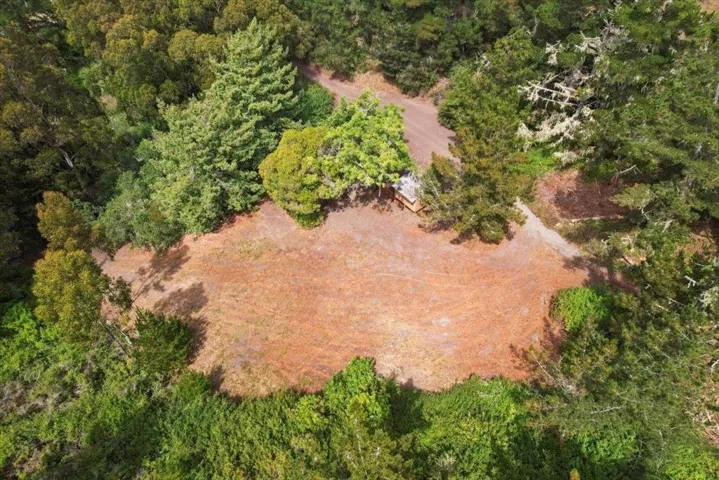 Overhead shot of open area around out buildings.