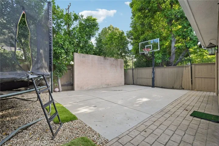 Court and Trampoline behind ADU