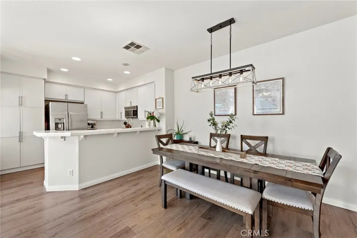 Notice the designer lights and Kitchen Bar