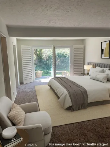 Large primary bedroom with sitting space (Virtually staged)