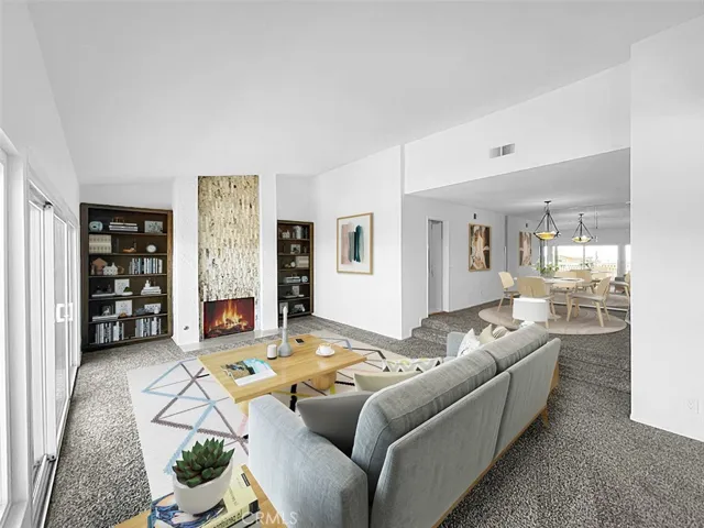 Living room and dining room (virtually staged)